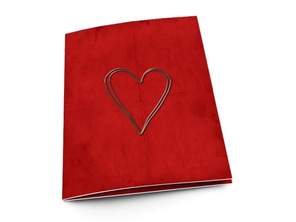 Menu mariage - Coeur argenté posé sur fond rouge